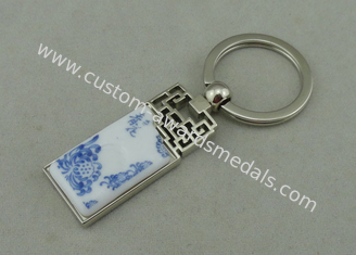 1.5 Inch Zinc Alloy Advertising Keychains With Porcelain Piece Inserted