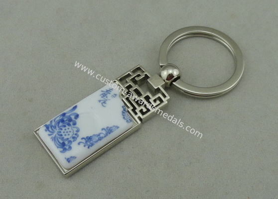 1.5 Inch Zinc Alloy Advertising Keychains With Porcelain Piece Inserted