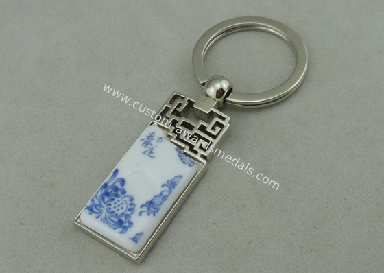 1.5 Inch Zinc Alloy Advertising Keychains With Porcelain Piece Inserted