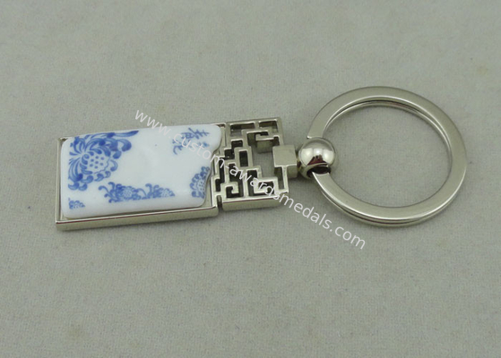 1.5 Inch Zinc Alloy Advertising Keychains With Porcelain Piece Inserted