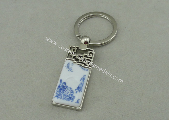 1.5 Inch Zinc Alloy Advertising Keychains With Porcelain Piece Inserted